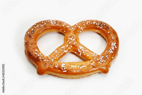 Fotografie, Obraz A Delicious Baked Soft Pretzel Over White
