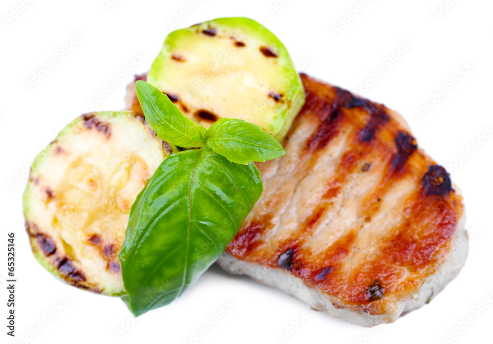 Grilled steak and grilled vegetables isolated on white