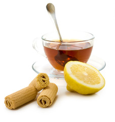 Wall Mural - isolated image of cup of tea and cookies on a white background