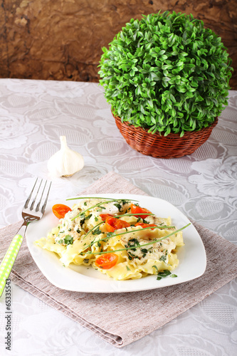 Fotografering Pasta with seafood, tomatoes and chives