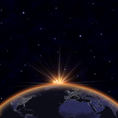 Wall Mural - planet earth with appearing sunlight. visible city lights.