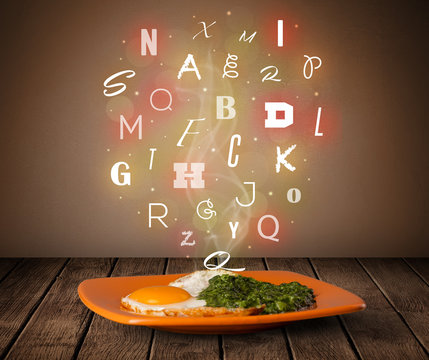 Fresh cook food with colorful letters on wood
