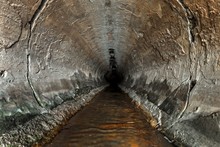 Deep Sewage Tunnel With Poinson Flowing