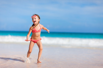 Adorable little girl at beach