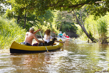 People boating on river