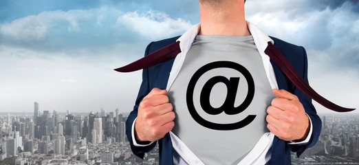 Poster - Composite image of businessman opening shirt in superhero style