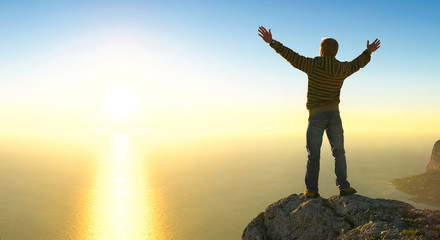 Wall Mural - champion on mountain top. sport and active life concept