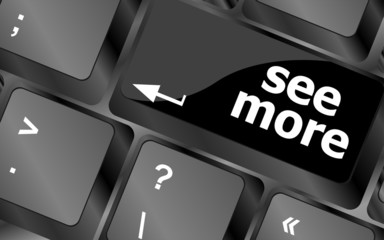 Fototapete - computer keyboard with see more keypad, search concept