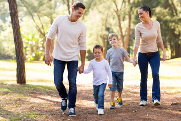 Wall Mural - family walking in park