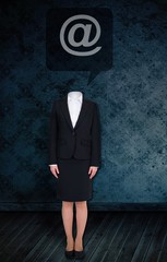 Poster - Composite image of headless businesswoman with at sign