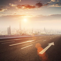 Urban road with sunset