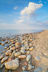 Wall Mural - Stones at the ocean beach. The Baltic Sea coast, Poland.