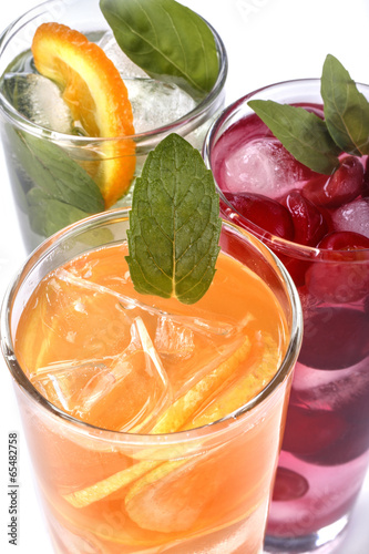 Fototapeta do kuchni iced drink with orange, cherry and mint 