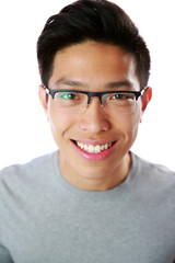 Poster - Closeup portrait of a happy asian man over white background