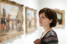  Woman Looking Pictures In  Museum