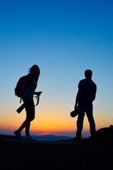 Wall Mural - photographers outdoor at sunset