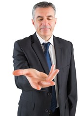 Aufkleber - Mature businessman standing with hand out