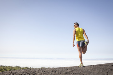 Man running outdoors, cross country trail run