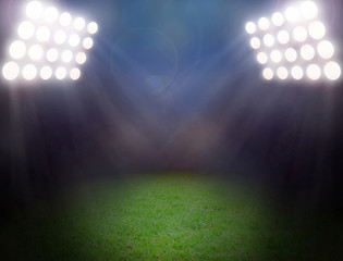 Wall Mural - Green soccer field, bright spotlights