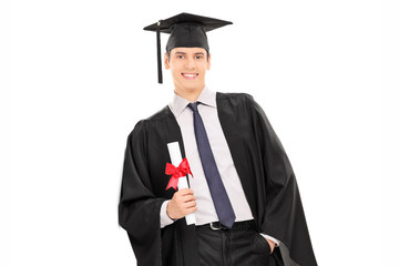 Wall Mural - Male graduate holding a diploma