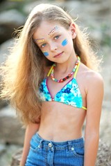 Wall Mural - portrait of little girl on the beach