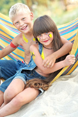 Wall Mural - Portrait of young children on a camping holiday