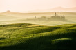 Idyllic view of hilly farmland in Tuscany morning light