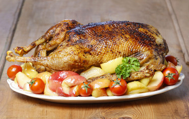 Canvas Print - Roasted goose on wooden table