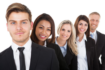 Wall Mural - Confident Businesspeople Standing In A Row