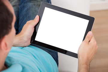 Poster - Man Looking At Blank Screen Of Digital Tablet