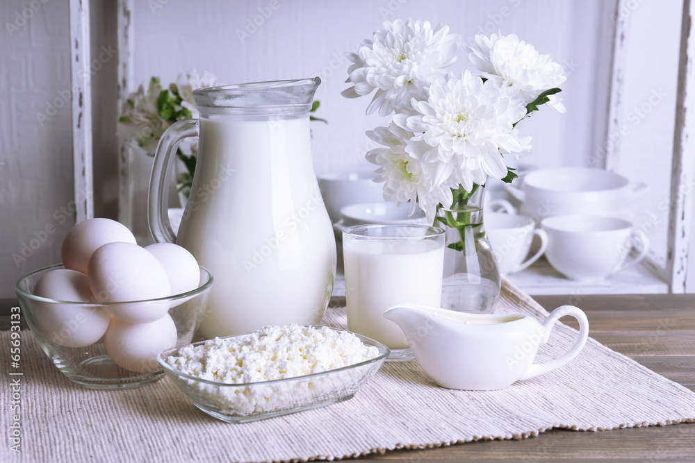 Still life with tasty dairy products on table