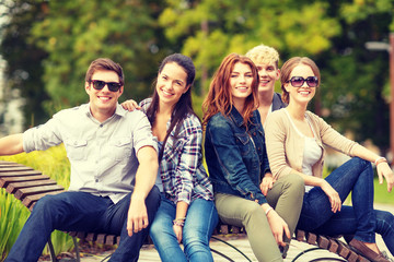 Canvas Print - group of students or teenagers hanging out