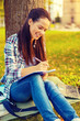 © Syda Productions - smiling teenager writing in notebook