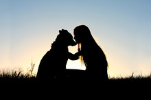 Woman Hugging Dog Silhouette