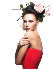 Wall Mural - Portrait of beautiful young woman with flowers in hair.