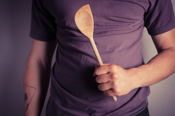 Man holding spoon