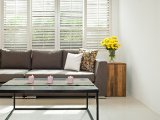 Grey sofa in simple setting