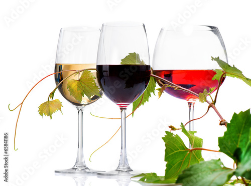 Naklejka ścienna Wine. Three Glasses of wine isolated on white