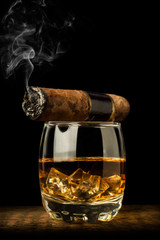 whiskey and smoking a cigar