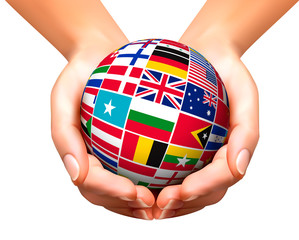 Wall Mural - Flags of the world in globe and hands. Vector illustration.