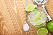 Classic Margarita Cocktail With Salty Rim On Wooden Table