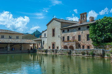 Ancient swimming pool with thermal water in Bagno Vignoni, Tusca