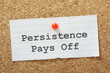 Persistence Pays Off on a cork notice board