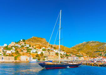 Wall Mural - beautiful sailing yacht in the port of Hydra island in Greece