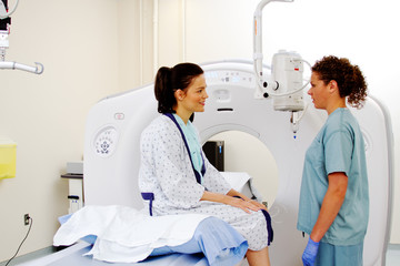 Technician reviewing ultrasound exam with patient