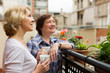 © JackF - Old women on balcony with coffee