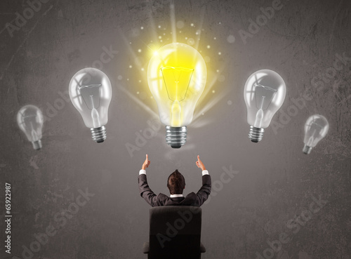 Fotografie, Obraz Business person having an idea light bulb concept