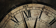 Grunge Old Clock Showing The Time Is After Midnight