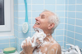 Fototapeta Młodzieżowe - Senior man bathing