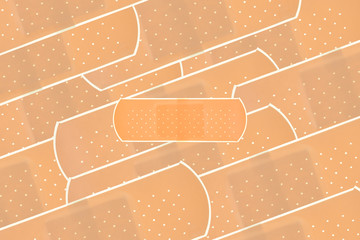 a group of sticky bandages with a smaller bandage in center